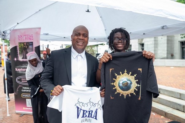Mayor Ras Baraka of Newark, NJ with teen entrepreneur.